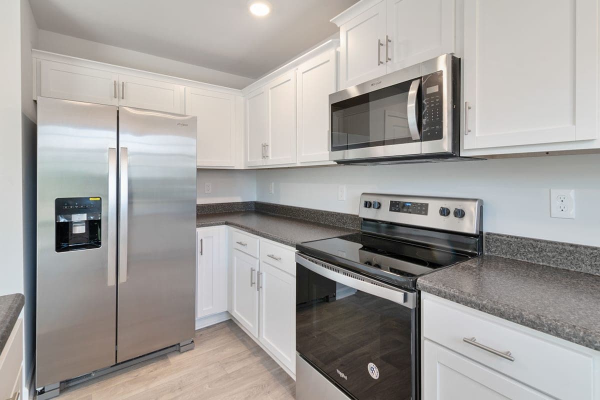 Stainless steel kitchen appliances in a fitted kitchen