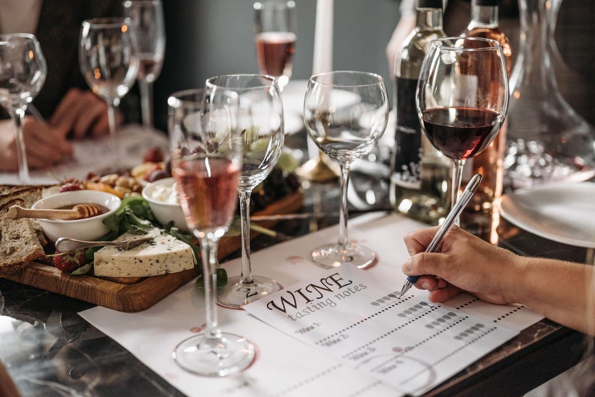 A glass of red wine and a glass of white wine on a table