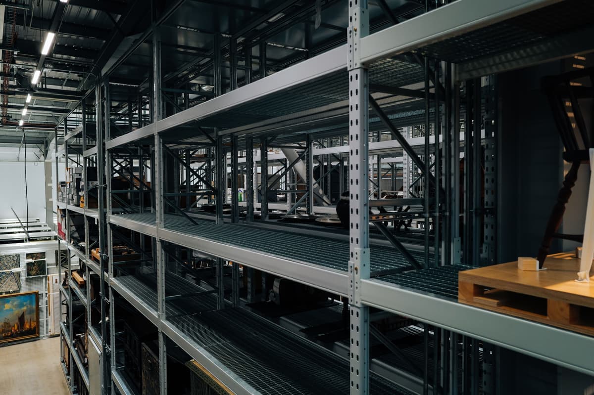 Empty metal storage racking in an industrial warehouse